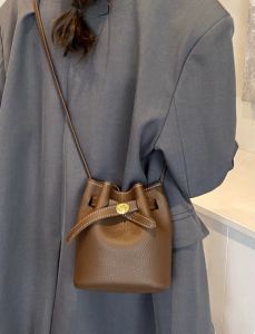 Korean version bucket bag for women 2026new simple crossbody commuting shoulder phone bag