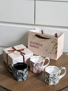 ถ้วยกาแฟเซรามิกทรงแปดเหลี่ยมทรงกลมสไตล์เรโทรสำหรับผู้หญิง ถ้วยน้ำเซรามิกลายดอกเดซี่ดีไซน์ดั้งเดิม ถ้วยกาแฟแบบลำลอง