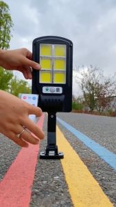 Lampu LED Teras Rumah BK-818-6 50 W dengan Keunggulan Sensor Gerak + Remote COB dan Menggunakan Tenaga Surya