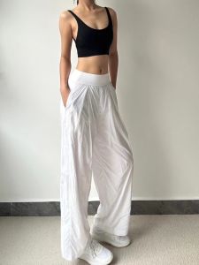 กางเกงวิ่งยาวผ้าตาข่ายลำลองสำหรับเล่นเทนนิส กางเกงขายาวทรงหลวมสำหรับเล่นโยคะ กางเกงขายาวผู้หญิง ฤดูร้อน 2025