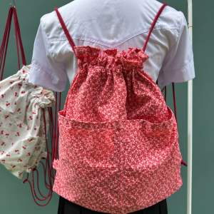 กระเป๋าเป้สะพายหลังลายดอกไม้💐