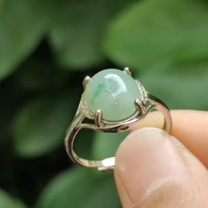 Crafted as Light Green Cabochon on Natural Type A Jadeite Jade set with S925 as Adjustable Ring certificate weighs 2.22 grams measurement 10.3 * 8.9 * 3.4 mm (s924ring24)
