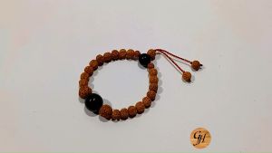 Gelang kayu kombinasi Biji Jenitri & kelor hitam modle tali serut