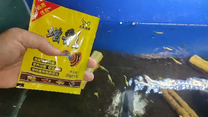 Thức ăn cho cá cảnh 7 Màu Guppy - Cám cá 7 màu vàng