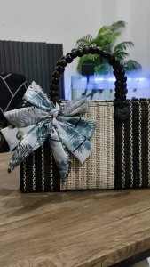 Franchescas Collection Handcrafted woven bag with beaded handles