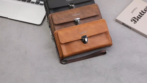 SEA YADOU  กระเป๋าสตางค์ใบยาวผู้ชายแบบใหม่มีซิปหัวเข็มขัดหลายช่องใส่บัตรกระเป๋าเงินมือถือแบบลำลองความจุขนาดใหญ่กระเป๋าคลัทช์อเนกประสงค์