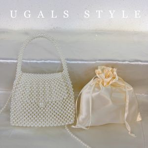 YOMOU | Traditional Chinese Pearl Beaded Saddle Bag