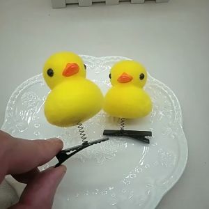 Set 2-5 Kẹp mái vịt lò xo vàng diện tết