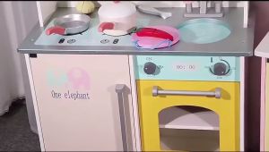 wooden kitchen toy pink and yellow with accessories