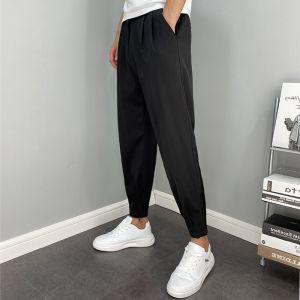 กางเกงสูทขาจั๊มกางเกงลำลองเก้าส่วนสไตล์เกาหลีรุ่นฤดูใบไม้ผลิและฤดูร้อนสำหรับผู้ชายกางเกงสูททรงฮาเร็มขาเดฟทรงหลวมหล่อเท่ยอดนิยมแมทช์ลุคง่าย