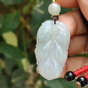 Crafted as Leaf on Natural Type A Jadeite Jade as Pendant certificate weighs 7.37 grams measurement 34.8 * 19.3 * 5.8 mm (pendant379)