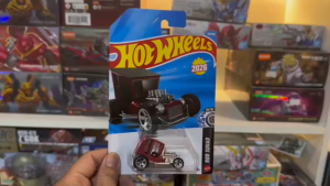 Mô Hình Xe Hot Wheels Uncertain-T Rod Squad 1/64 New 2026 (Card Vỉ Original)