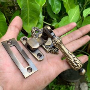 grendel jendela rambuncis ukir... bahan kuningan