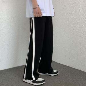 กางเกงขายาวทรงตรงหลวมๆ สำหรับผู้ชาย ทรงลำลอง สไตล์ย้อนยุค สีสันสดใส กางเกงขายาวทรงตรงสำหรับผู้ชายไซส์ใหญ่