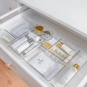 The drawer is equipped with built-in storage boxes and the desktop is transparent for stationery and sundries