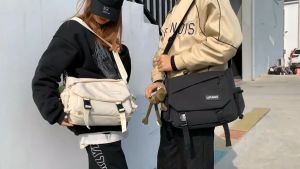 กระเป๋าผู้ชายทรงทแยงมุมกระเป๋าผู้ชายสไตล์ญี่ปุ่น ความจุกใหญ่ใส่ของได้เยอะสำหรับผู้ชายผู้หญิง