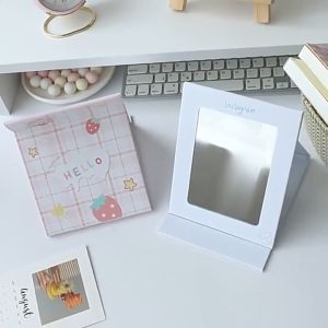 {\n \"article\": \" CERMIN LIPAT UK 15 X 11 COVER LUCU - KACA BUKU PORTABLE SH