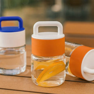 Sudyod【มีสินค้าในสต๊อก】 300ml กระปุกแก้ว กระบอกน้ำพกพา มีหูหิ้วพกพาสะดวก ฝาพลาสติกหนาอย่างดี Glass water cup