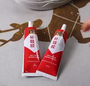 Keo Dán Giày Trong Suốt 60ml – Combo 2 Tuýp – Hơ Nhiệt Dính Chắc Chống Nước An Toàn Cho Da Tay