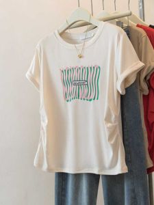 เสื้อยืดแขนสั้นทรงเข้ารูปสำหรับผู้หญิงไซส์ใหญ่ ฤดูร้อน 2025 เสื้อตัวบนกระชับสัดส่วน ปกปิดหน้าท้อง ดีไซน์เก๋ไก๋ ลำลอง สไตล์เกาหลี