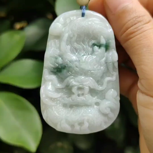 Green Floating Patches rare old-school Natural Type-A Jadeite-Jade crafted with traditional Dragon as Pendant certificate weighs 34.91 grams measurement 60.6 * 38.8 * 8.2 mm (pendant302)
