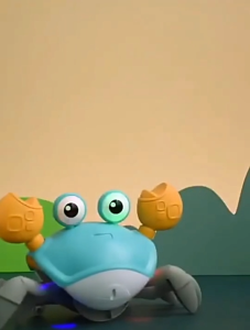 ของเล่นเด็กหลีกเลี่ยงสิ่งกีดขวางแบบชาร์จไฟได้พร้อมเสียงเพลงและไฟ ปูคลานพร้อมแสงไฟและเสียงเพลง