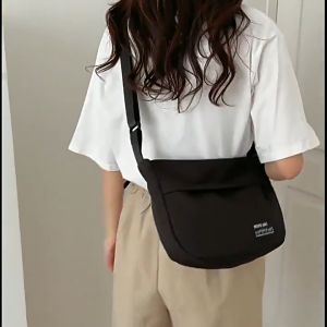 QNQN กระเป๋าสะพายแฟชั่นเรียบง่ายสำหรับสุภาพสตรี กระเป๋าสะพายกลางแจ้ง กระเป๋าสะพายไหล่ กระเป๋าสะพายไหล่ขนาดใหญ่แบบสบาย ๆ กระเป๋าสะพายไหล่สำหรับนักเรียน