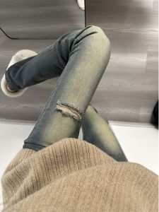 กางเกงยีนส์ทรงขากระบอกเล็กเอวสูงสไตล์อเมริกันสตรีทสไตล์ย้อนยุคสำหรับผู้หญิง กางเกงขายาวทรงสลิมฟิตดีไซน์กระดูกสันหลัง