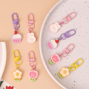 C.three Little Fresh Flower Key Chain: A Cute Cartoon Resin Pendant for Backpacks