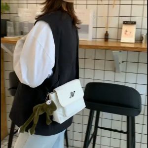 กระเป๋าสะพายของคุณ ความงาม สีขาว สีดำ กระเป๋าผ้าแคนวาส กระเป๋าMessenger 2 สี สีขาว สีดำ วินเทจ แฟชั่น สำหรับสะพายบริเวณ ข้าง วินเทจ