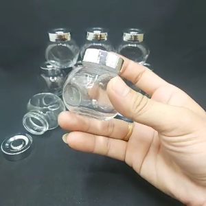 Hũ Thủy Tinh Nhỏ 50ML (1 cái) mẫu tròn dẹt kiểu nghiêng 2 đáy nắp nhựa màu bạc - Hủ Thủy Tinh Nhỏ siêu trong đựng thực phẩm mỹ phẩm