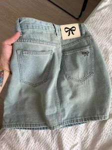 กระโปรงยีนส์ทรงเอเอวสูงสไตล์อเมริกันย้อนยุคสำหรับผู้หญิงไซส์ใหญ่ กระโปรงสั้นทรงเอหลวมๆ สไตล์ใหม่ ฤดูร้อน 2024