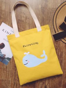 กระเป๋าผ้าใบสไตล์เกาหลีสำหรับผู้หญิง กระเป๋าสะพายไหล่แบบลำลอง กระเป๋าถือ กระเป๋าใส่หนังสือ กระเป๋าช้อปปิ้ง กระเป๋าผ้าใบลายการ์ตูน