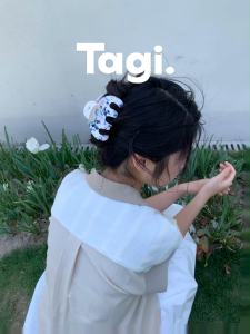 Tagi. Call me Bag Hair Claw