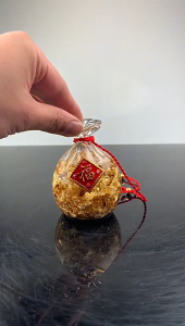 Túi Tiền nước Vàng lá thu hút tài lộc cân bằng phong thủy Đặt Bàn Thờ Thần Tài