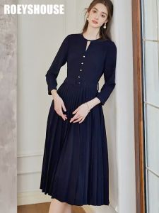 Đầm xếp ly tùng xoè cổ tròn kiểu tay dài màu xanh đen