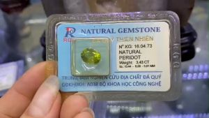 Viên Đá Peridot Ngọc Olivin Thiên Nhiên Đá Phong Thủy Loại Lớn Mài Giác Oval Kiểm Định