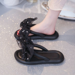 รองเท้าแตะผู้หญิง ฤดูร้อน 2024 รองเท้าแตะชายหาดแบบสวมสบาย ป้องกันการลื่น กลิ่นไม่ดี รุ่นใหม่ พู่ปมมุก รองเท้าแตะแบบสวมสบาย