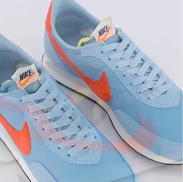 Nike blue on sale and orange trainers