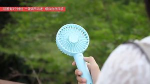 Macaron USB charging small mini hand-held fans desktop portable multi-function mobile phone holder silent strong wind