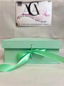 Flip Top Box 10x10x4 inchesMint green gift box with satin ribbon closure.