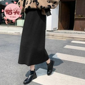 กระโปรงยาวปานกลางทรงเข้ารูปเอวสูงถักหนาสำหรับผู้หญิงไซส์ใหญ่ เสื้อผ้าทำงานสไตล์เกาหลี สีพื้น ฤดูใบไม้ร่วง 2020