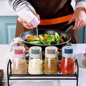4ชิ้นเชคเกอร์ขวดเก็บพริกไทยเกลือแบบกดที่มีความแม่นยำใสสามารถเติมได้เชคเกอร์ในครัวพร้อมฟังก์ชันการวัดขวดเครื่องเทศกันรั่วสำหรับทำอาหาร