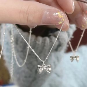 Korean Bow Knot Necklace: A Simple Silver Bow Pendant & Romantic Clavicle Chain