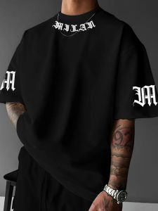 A new mens T-shirt for the summer of 2025 featuring casual and fashionable letter prints and breathable streetwear style