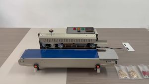 Paris store เครื่องซีลสายพาน FR900 วันที่พิมพ์ได้ จอแสดงผลดิจิตอล ปรับความเร็วได้ โหลดได้ 24 ชม. โดยไม่ทำให้เครื่องไหม้