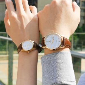 OLEVS resmi autentik jam tangan couple suami istri terbaru 2025 mode elegan anti air bercahaya kalender dial jam tangan kulit