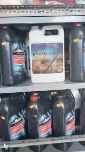 Nước làm mát giải nhiệt động cơ ô tô màu đỏ hoặc xanh. Loại can 4 lit loại 10% Ethylene Glycol