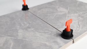 Alat Perata Pasang Nat Keramik Tipe Putar 1.5mm Ekonomi Tile Spacer Leveling System