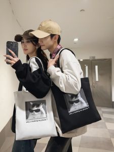 กระเป๋าผ้าใบลายแมวแฟชั่นสไตล์ญี่ปุ่นสำหรับนักเรียนและนักศึกษา กระเป๋าถือใส่หนังสือ กระเป๋าสะพายไหล่แบบลำลองสำหรับเยาวชน